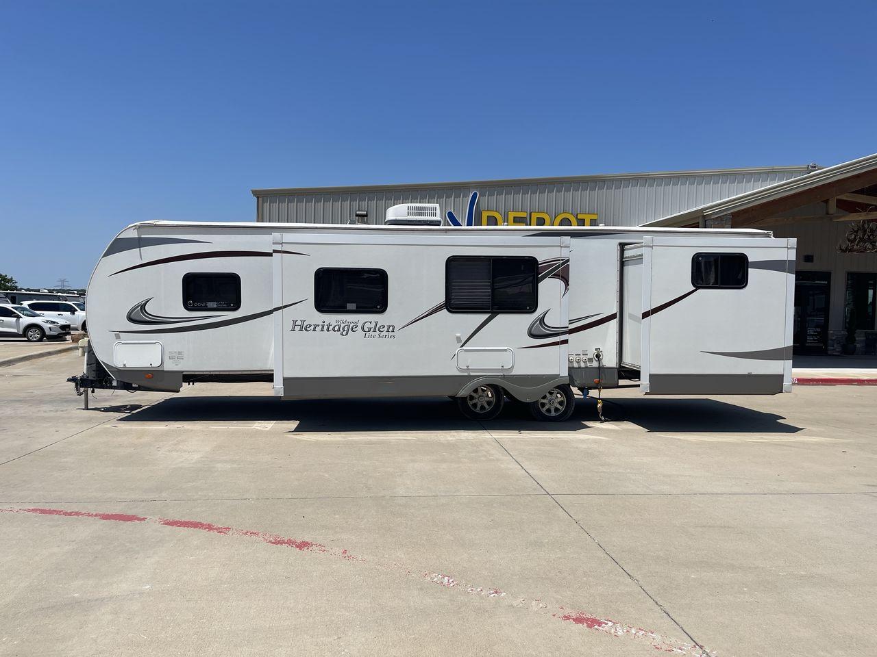 2013 FOREST RIVER HERITAGE GLEN 312QBU (4X4TWBG20DU) , Length: 35.83 ft | Dry Weight: 6,840 lbs. | Slides: 2 transmission, located at 4319 N Main Street, Cleburne, TX, 76033, (817) 221-0660, 32.435829, -97.384178 - The 2013 Forest River Heritage Glen 312QBUD is a travel trailer that changes the way you camp by combining comfort, style, and usefulness in a perfect way. This 35.83-foot marvel is made to make every trip an exciting adventure to remember. When it comes to weight, the Heritage Glen 312QBUD is made - Photo #25