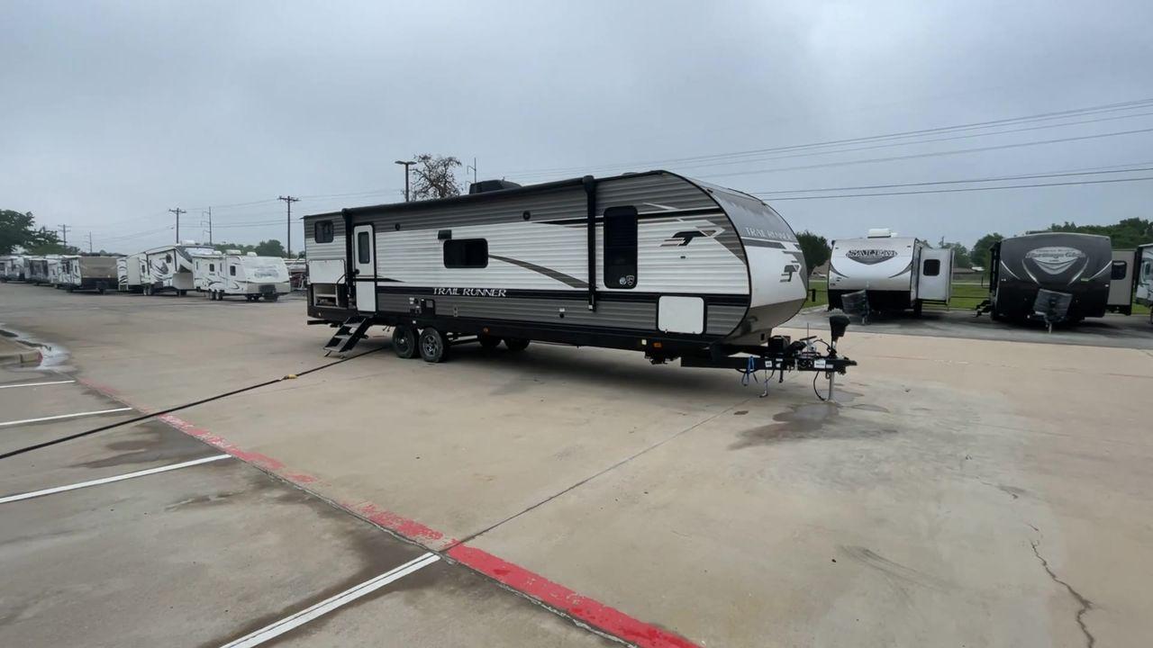 2022 HEARTLAND TRAIL RUNNER 31DB (5SFEB3724NE) , Length: 36.92 ft. | Dry Weight: 7,040 lbs. | Gross Weight: 9,642 lbs. | Slides: 1 transmission, located at 4319 N Main Street, Cleburne, TX, 76033, (817) 221-0660, 32.435829, -97.384178 - The 2022 Heartland Trail Runner 31DB is a flexible, family-friendly travel trailer that will make your camping trip more enjoyable. With a length of 36.92 feet and a dry weight of 7,040 pounds, this trailer gives you plenty of room and comfort for your trips. The gross weight of 9,642 pounds means t - Photo #3