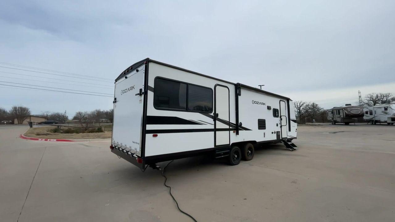 2021 FOREST RIVER OZARK 2700THX (5ZT2ZKSB7MG) , Length: 32.33 ft. | Dry Weight: 5,683 lbs. | Gross Weight: 7,830 lbs. | Slides: 1 transmission, located at 4319 N Main Street, Cleburne, TX, 76033, (817) 221-0660, 32.435829, -97.384178 - Measuring ~32 feet in length, this RV combines compactness with functionality, making it an ideal choice for both weekend getaways and extended road trips. The Ozark 2700THX features a features a single slide-out, providing a well-designed and spacious interior. The 2700THX boasts a dedicated garage - Photo #1
