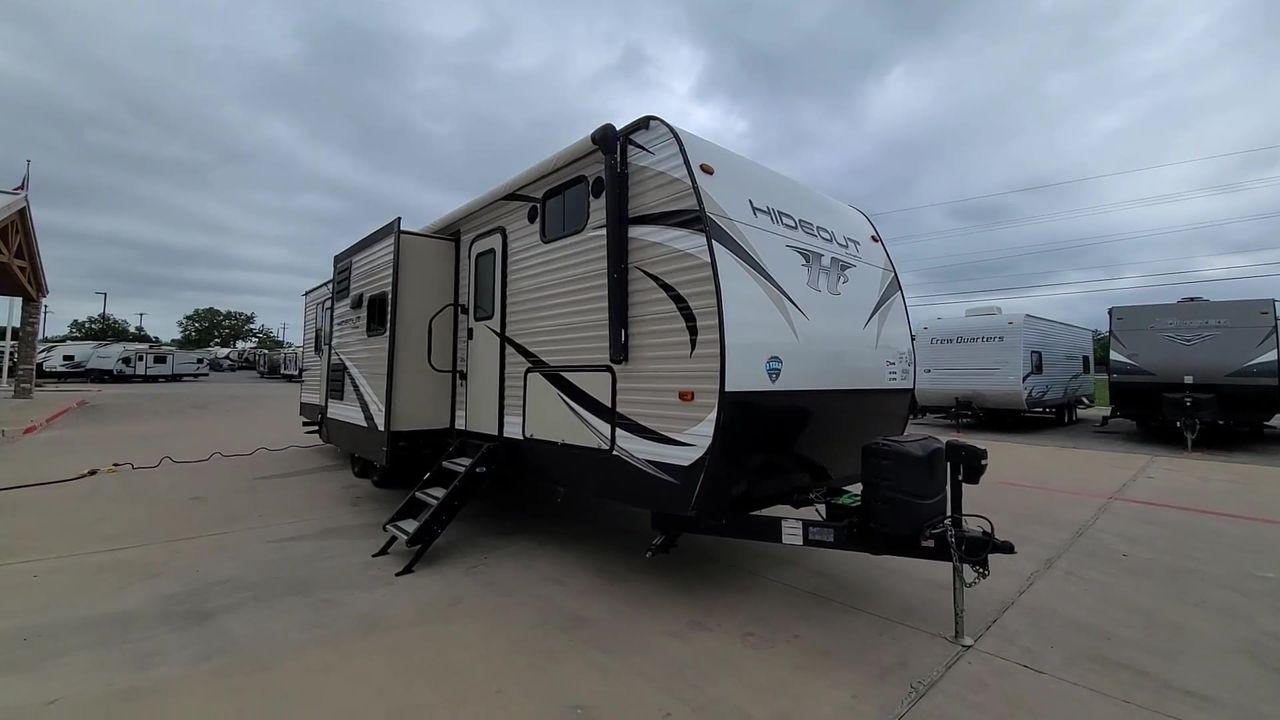 2019 KEYSTONE HIDEOUT 32BHTS (4YDT32F20K3) , Length: 37.67 ft. | Dry Weight: 8,634 lbs. | Gross Weight: 11,200 lbs. | Slides: 3 transmission, located at 4319 N Main St, Cleburne, TX, 76033, (817) 678-5133, 32.385960, -97.391212 - The 2019 Keystone Hideout 32BHTS is a spacious and family-friendly travel trailer, measuring 37 feet 7 inches in length, 8 feet in width, and 11 feet 4 inches in height, with a dry weight of 8,600 lbs and a GVWR of 11,200 lbs. Constructed with a cambered chassis and a full walk-on roof on a powder-c - Photo #5