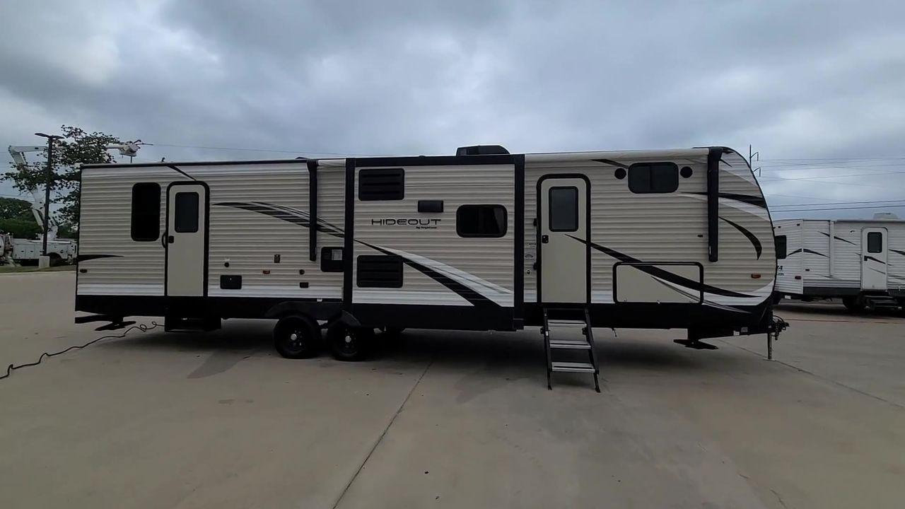 2019 KEYSTONE HIDEOUT 32BHTS (4YDT32F20K3) , Length: 37.67 ft. | Dry Weight: 8,634 lbs. | Gross Weight: 11,200 lbs. | Slides: 3 transmission, located at 4319 N Main Street, Cleburne, TX, 76033, (817) 221-0660, 32.435829, -97.384178 - The 2019 Keystone Hideout 32BHTS is a spacious and family-friendly travel trailer, measuring 37 feet 7 inches in length, 8 feet in width, and 11 feet 4 inches in height, with a dry weight of 8,600 lbs and a GVWR of 11,200 lbs. Constructed with a cambered chassis and a full walk-on roof on a powder-c - Photo #6