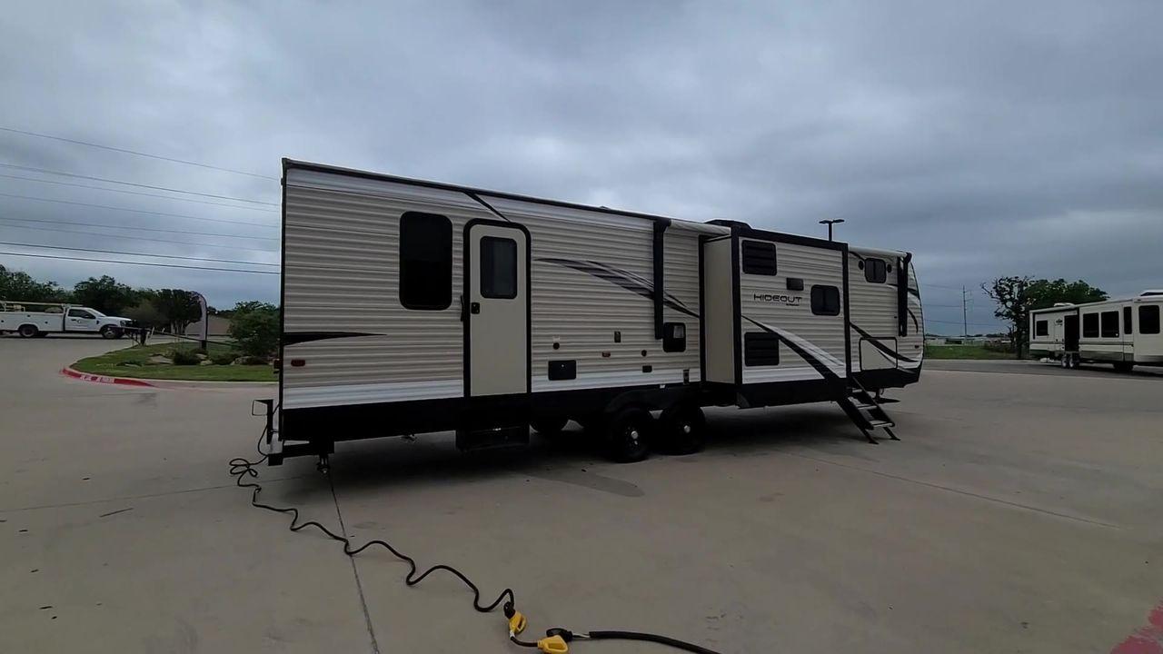 2019 KEYSTONE HIDEOUT 32BHTS (4YDT32F20K3) , Length: 37.67 ft. | Dry Weight: 8,634 lbs. | Gross Weight: 11,200 lbs. | Slides: 3 transmission, located at 4319 N Main St, Cleburne, TX, 76033, (817) 678-5133, 32.385960, -97.391212 - The 2019 Keystone Hideout 32BHTS is a spacious and family-friendly travel trailer, measuring 37 feet 7 inches in length, 8 feet in width, and 11 feet 4 inches in height, with a dry weight of 8,600 lbs and a GVWR of 11,200 lbs. Constructed with a cambered chassis and a full walk-on roof on a powder-c - Photo #7