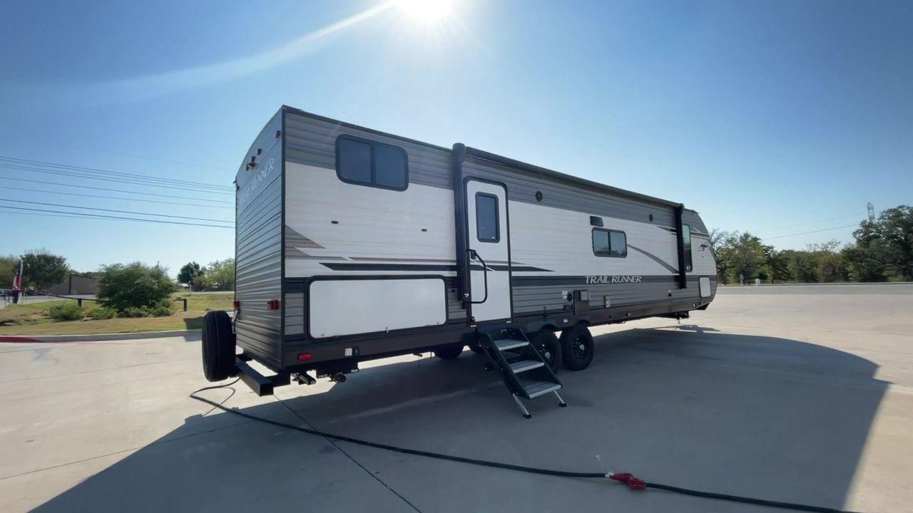 2022 HEARTLAND TRAIL RUNNER 31DB (5SFEB3728NE) , Length: 36.92 ft. | Dry Weight: 7,040 lbs. | Gross Weight: 9,642 lbs. | Slides: 1 transmission, located at 4319 N Main St, Cleburne, TX, 76033, (817) 678-5133, 32.385960, -97.391212 - Discover extra features that contribute to making this RV an ideal investment. (1) It features like a designated pet feeding station and easy-to-clean flooring, making your pet feel just as welcome as the human members of the crew. (2) The Trail Runner 31DB features a convenient pass-through st - Photo #1
