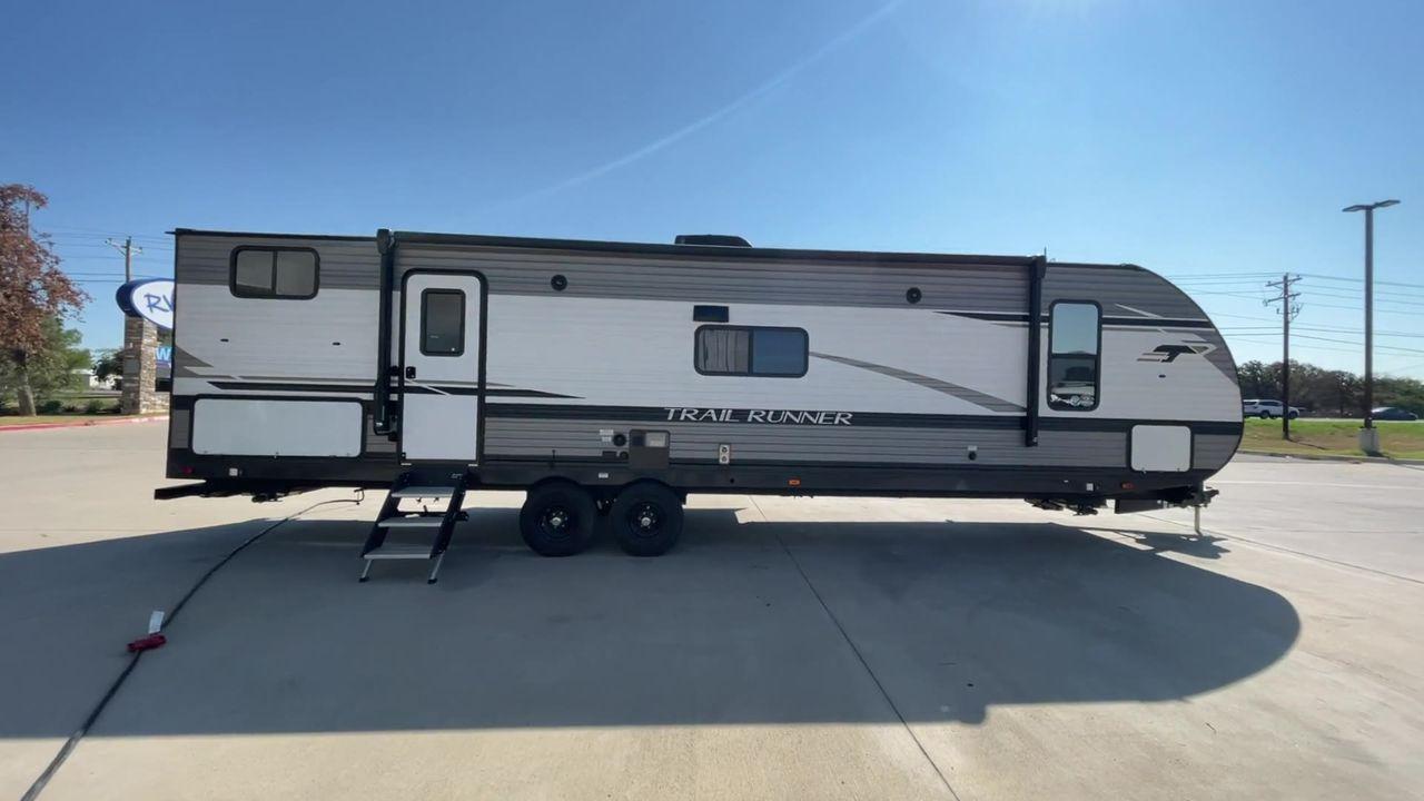2022 HEARTLAND TRAIL RUNNER 31DB (5SFEB3728NE) , Length: 36.92 ft. | Dry Weight: 7,040 lbs. | Gross Weight: 9,642 lbs. | Slides: 1 transmission, located at 4319 N Main Street, Cleburne, TX, 76033, (817) 221-0660, 32.435829, -97.384178 - Discover extra features that contribute to making this RV an ideal investment. (1) It features like a designated pet feeding station and easy-to-clean flooring, making your pet feel just as welcome as the human members of the crew. (2) The Trail Runner 31DB features a convenient pass-through st - Photo #2