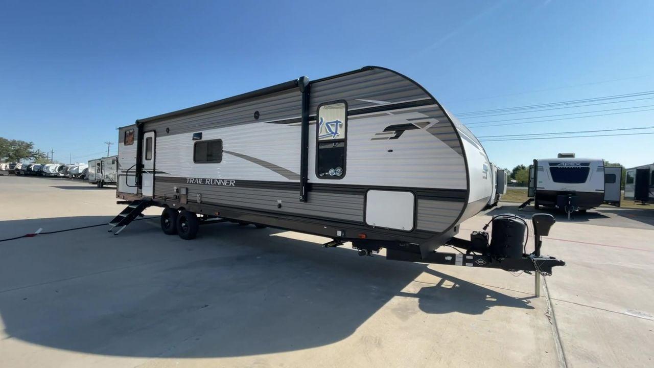 2022 HEARTLAND TRAIL RUNNER 31DB (5SFEB3728NE) , Length: 36.92 ft. | Dry Weight: 7,040 lbs. | Gross Weight: 9,642 lbs. | Slides: 1 transmission, located at 4319 N Main Street, Cleburne, TX, 76033, (817) 221-0660, 32.435829, -97.384178 - Discover extra features that contribute to making this RV an ideal investment. (1) It features like a designated pet feeding station and easy-to-clean flooring, making your pet feel just as welcome as the human members of the crew. (2) The Trail Runner 31DB features a convenient pass-through st - Photo #3