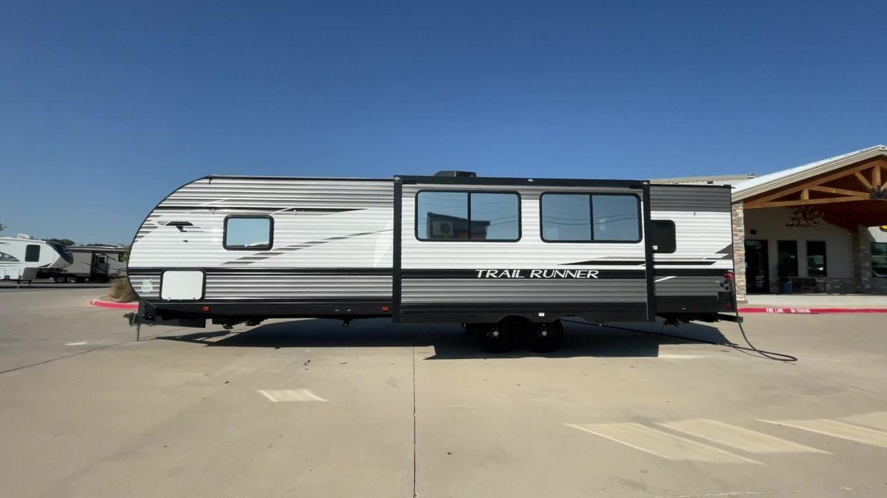2022 HEARTLAND TRAIL RUNNER 31DB (5SFEB3728NE) , Length: 36.92 ft. | Dry Weight: 7,040 lbs. | Gross Weight: 9,642 lbs. | Slides: 1 transmission, located at 4319 N Main Street, Cleburne, TX, 76033, (817) 221-0660, 32.435829, -97.384178 - Discover extra features that contribute to making this RV an ideal investment. (1) It features like a designated pet feeding station and easy-to-clean flooring, making your pet feel just as welcome as the human members of the crew. (2) The Trail Runner 31DB features a convenient pass-through st - Photo #6