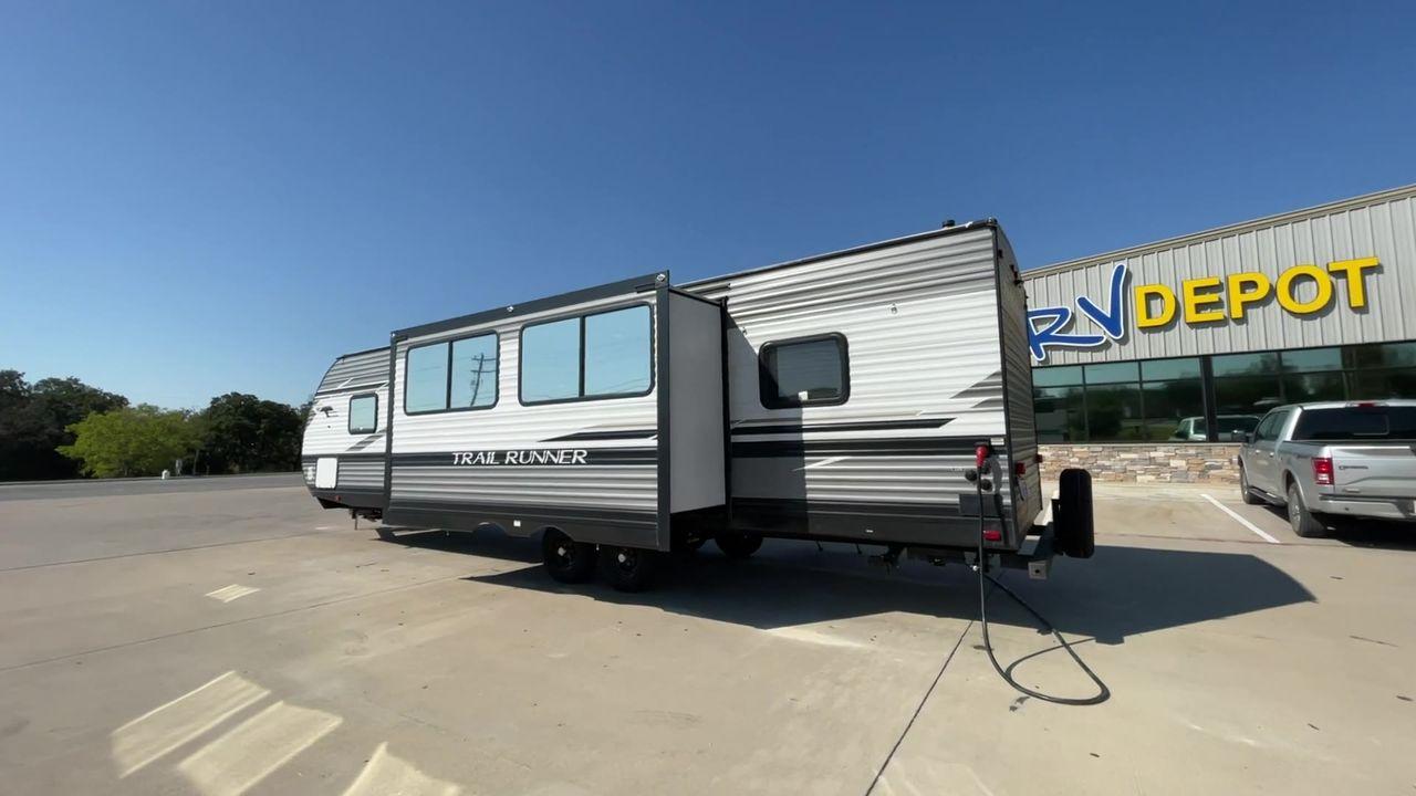 2022 HEARTLAND TRAIL RUNNER 31DB (5SFEB3728NE) , Length: 36.92 ft. | Dry Weight: 7,040 lbs. | Gross Weight: 9,642 lbs. | Slides: 1 transmission, located at 4319 N Main Street, Cleburne, TX, 76033, (817) 221-0660, 32.435829, -97.384178 - Discover extra features that contribute to making this RV an ideal investment. (1) It features like a designated pet feeding station and easy-to-clean flooring, making your pet feel just as welcome as the human members of the crew. (2) The Trail Runner 31DB features a convenient pass-through st - Photo #7
