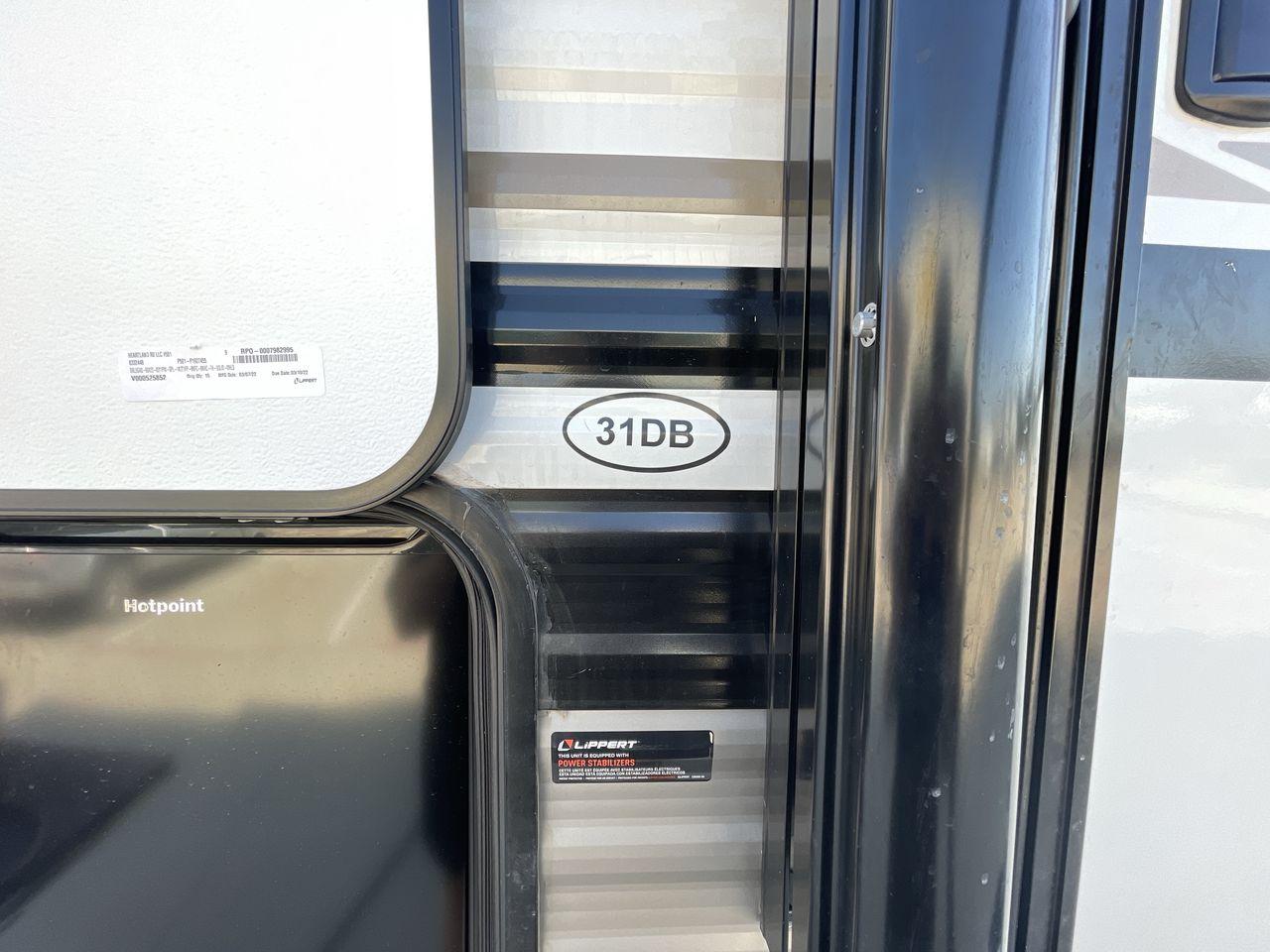 2022 HEARTLAND TRAIL RUNNER 31DB (5SFEB3728NE) , Length: 36.92 ft. | Dry Weight: 7,040 lbs. | Gross Weight: 9,642 lbs. | Slides: 1 transmission, located at 4319 N Main St, Cleburne, TX, 76033, (817) 678-5133, 32.385960, -97.391212 - Discover extra features that contribute to making this RV an ideal investment. (1) It features like a designated pet feeding station and easy-to-clean flooring, making your pet feel just as welcome as the human members of the crew. (2) The Trail Runner 31DB features a convenient pass-through st - Photo #21
