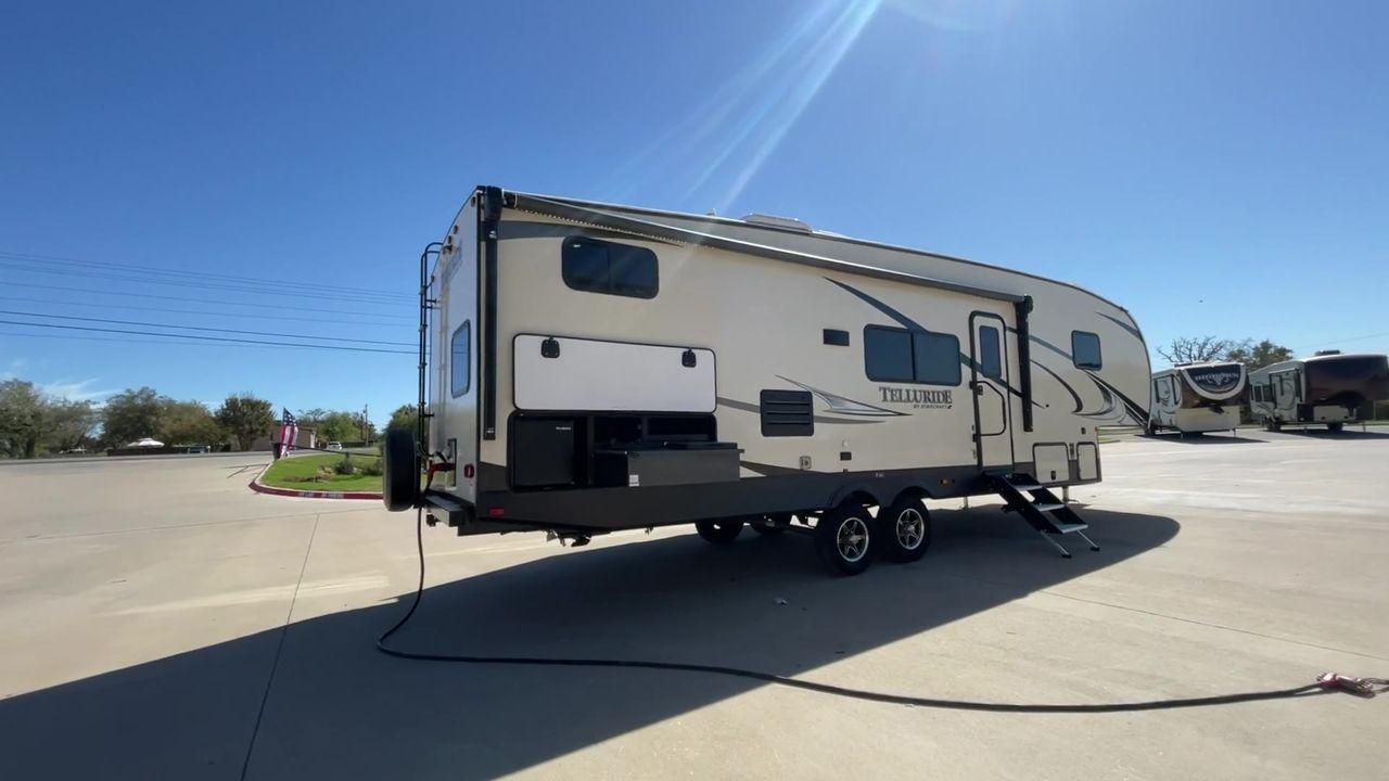 2021 STARCRAFT TELLURIDE 297BHS (1SACS0BS6M3) , Slides: 2 transmission, located at 4319 N Main Street, Cleburne, TX, 76033, (817) 221-0660, 32.435829, -97.384178 - Discover the ultimate blend of luxury and adaptability with the 2021 Starcraft Telluride 297BHS. This fifth wheel comes with two slideouts and a spacious 21-foot power awning, providing plenty of room for outdoor relaxation and entertainment. Designed to comfortably accommodate up to 10 people, this - Photo #1