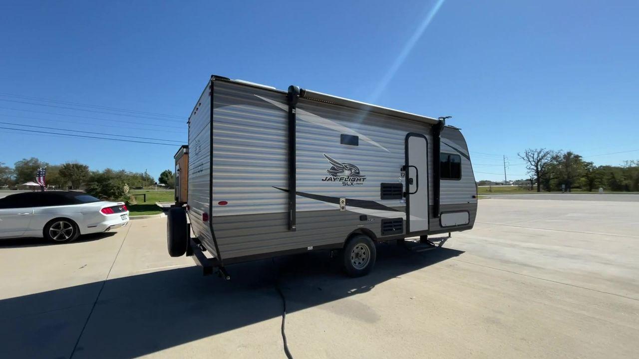 2021 JAYCO JAY FLIGHT SLX 174BH (1UJBJ0AJ1M1) , Length: 21.67 ft | Dry Weight: 3,075 lbs | GVWR: 3,950 lbs | Slides: 0 transmission, located at 4319 N Main St, Cleburne, TX, 76033, (817) 678-5133, 32.385960, -97.391212 - Take the 2021 Jayco Jay Flight SLX 174BH travel trailer out on your camping adventures. This lightweight and small RV is ideal for people looking for an affordable and cozy way to enjoy the great outdoors. The dimensions of this unit are 21.67 ft in length, 7.08 ft in width, and 9.17 ft in height. I - Photo #1