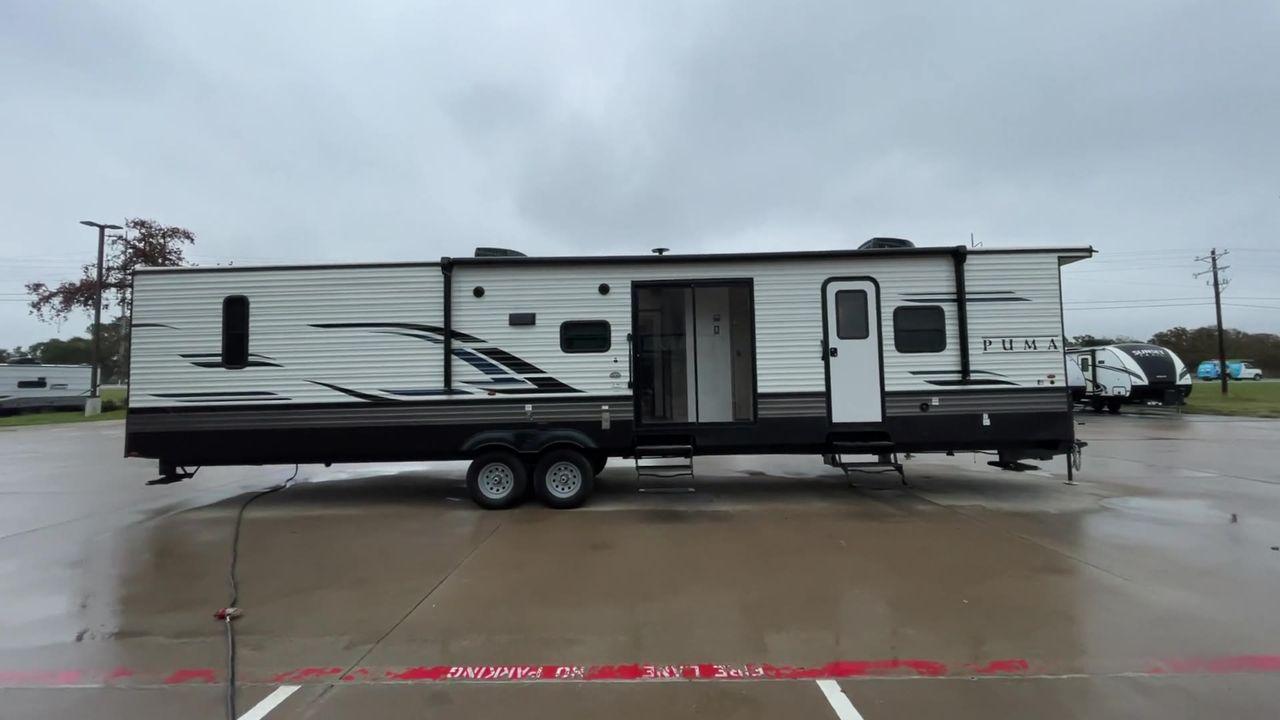 2022 FOREST RIVER PUMA TOWABLES (4X4TPUR22PP) , Length: 42.33 ft. | Dry Weight: 10,162 lbs. | Gross Weight: 12,000 lbs.| Slides: 3 transmission, located at 4319 N Main St, Cleburne, TX, 76033, (817) 678-5133, 32.385960, -97.391212 - If you're in the market for a top-of-the-line travel trailer bunk house, look no further than this 2022 PUMA 39DBT available at RV Depot in Cleburne, TX. With its exceptional features and unbeatable price of $60,995, this vehicle is a steal for any outdoor enthusiast. The 2022 PUMA 39DBT is desig - Photo #2