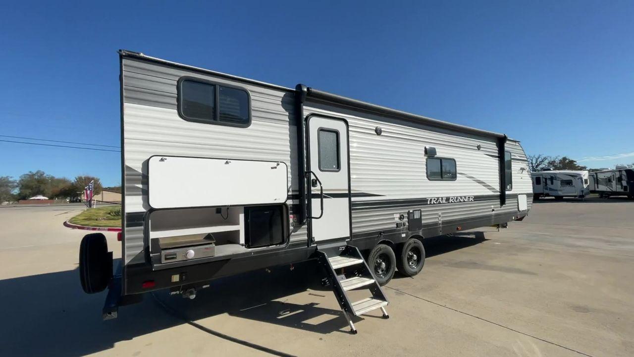2023 HEARTLAND TRAIL RUNNER 31DB (5SFEB3720PE) , Length: 36.92 ft. | Dry Weight: 7,040 lbs. | Gross Weight: 9,642 lbs. | Slides: 1 transmission, located at 4319 N Main St, Cleburne, TX, 76033, (817) 678-5133, 32.385960, -97.391212 - The 2023 Heartland Trail Runner 31DB is a versatile and spacious travel trailer designed for families and adventure enthusiasts. This vehicle is the perfect option for families or groups looking to embark on memorable road trips. The travel trailer is a bunkhouse, and features a family-centric layou - Photo #1
