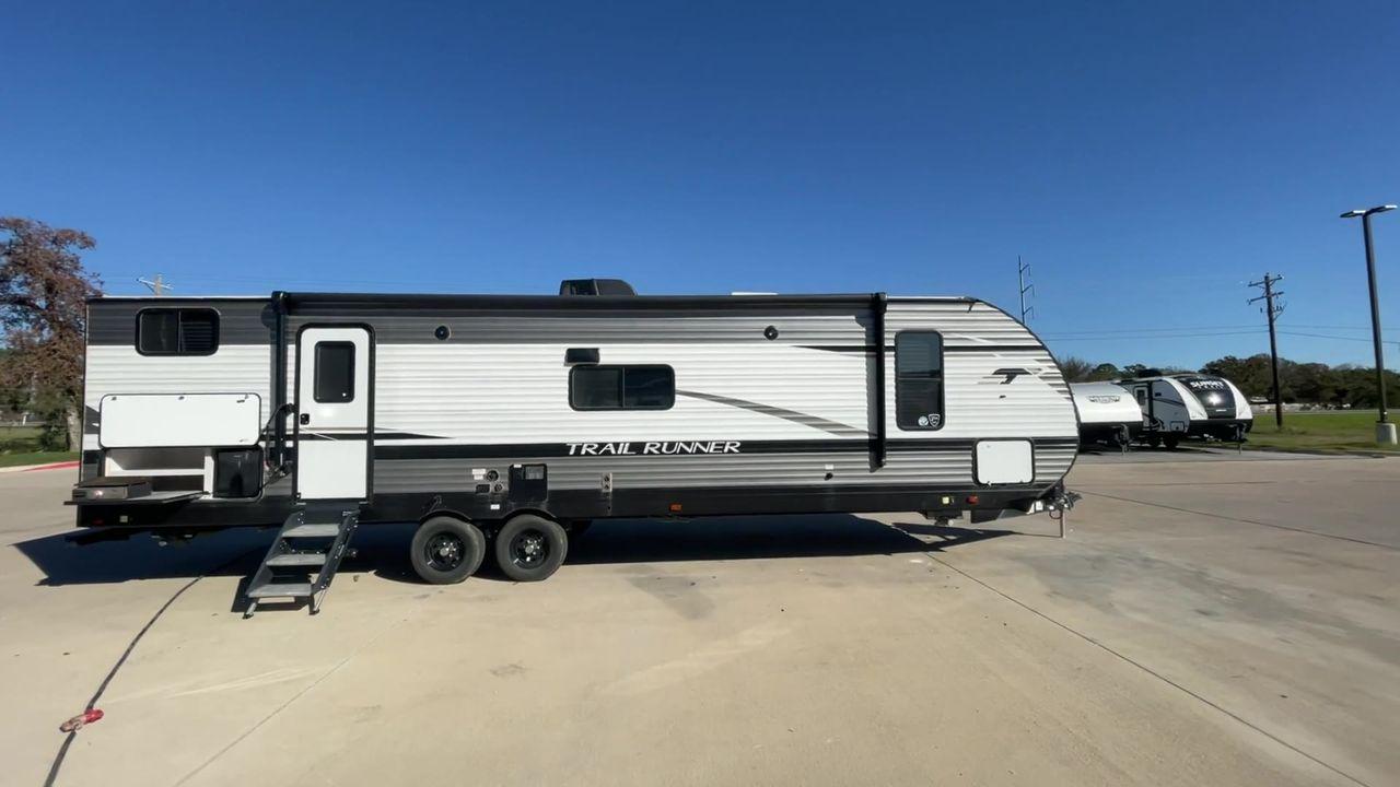 2023 HEARTLAND TRAIL RUNNER 31DB (5SFEB3720PE) , Length: 36.92 ft. | Dry Weight: 7,040 lbs. | Gross Weight: 9,642 lbs. | Slides: 1 transmission, located at 4319 N Main St, Cleburne, TX, 76033, (817) 678-5133, 32.385960, -97.391212 - The 2023 Heartland Trail Runner 31DB is a versatile and spacious travel trailer designed for families and adventure enthusiasts. This vehicle is the perfect option for families or groups looking to embark on memorable road trips. The travel trailer is a bunkhouse, and features a family-centric layou - Photo #2