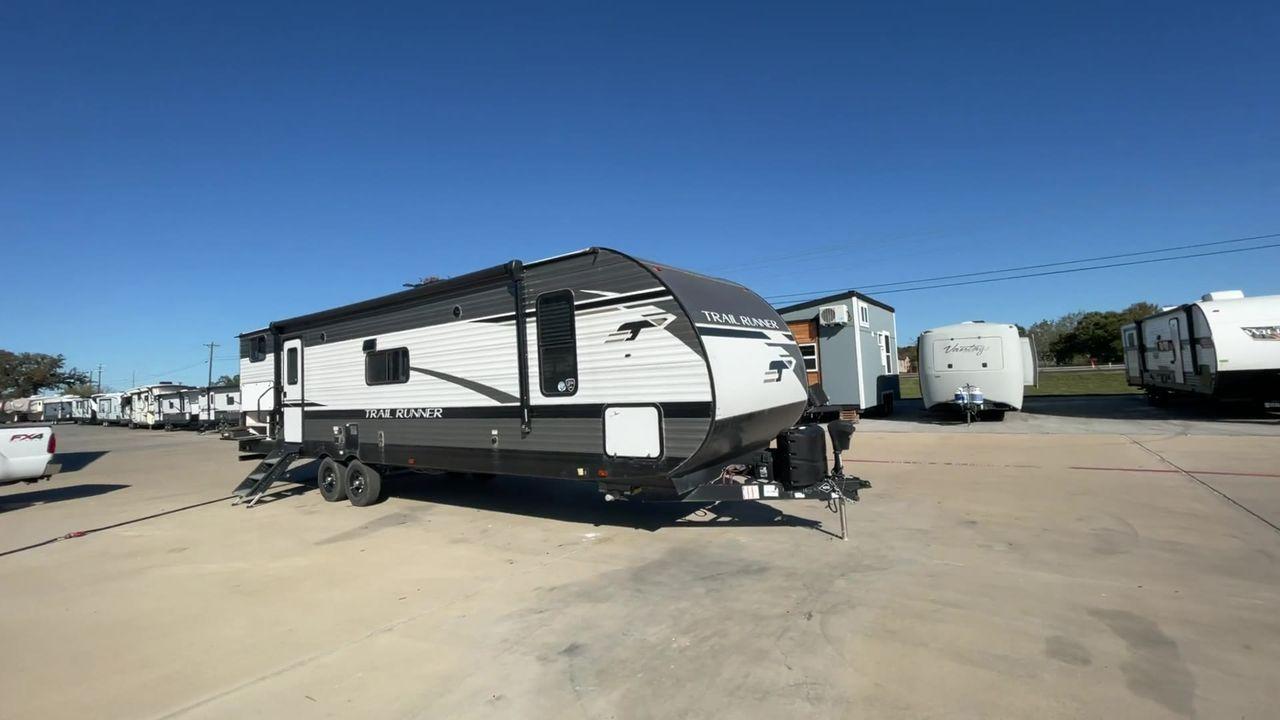 2023 HEARTLAND TRAIL RUNNER 31DB (5SFEB3720PE) , Length: 36.92 ft. | Dry Weight: 7,040 lbs. | Gross Weight: 9,642 lbs. | Slides: 1 transmission, located at 4319 N Main St, Cleburne, TX, 76033, (817) 678-5133, 32.385960, -97.391212 - The 2023 Heartland Trail Runner 31DB is a versatile and spacious travel trailer designed for families and adventure enthusiasts. This vehicle is the perfect option for families or groups looking to embark on memorable road trips. The travel trailer is a bunkhouse, and features a family-centric layou - Photo #3