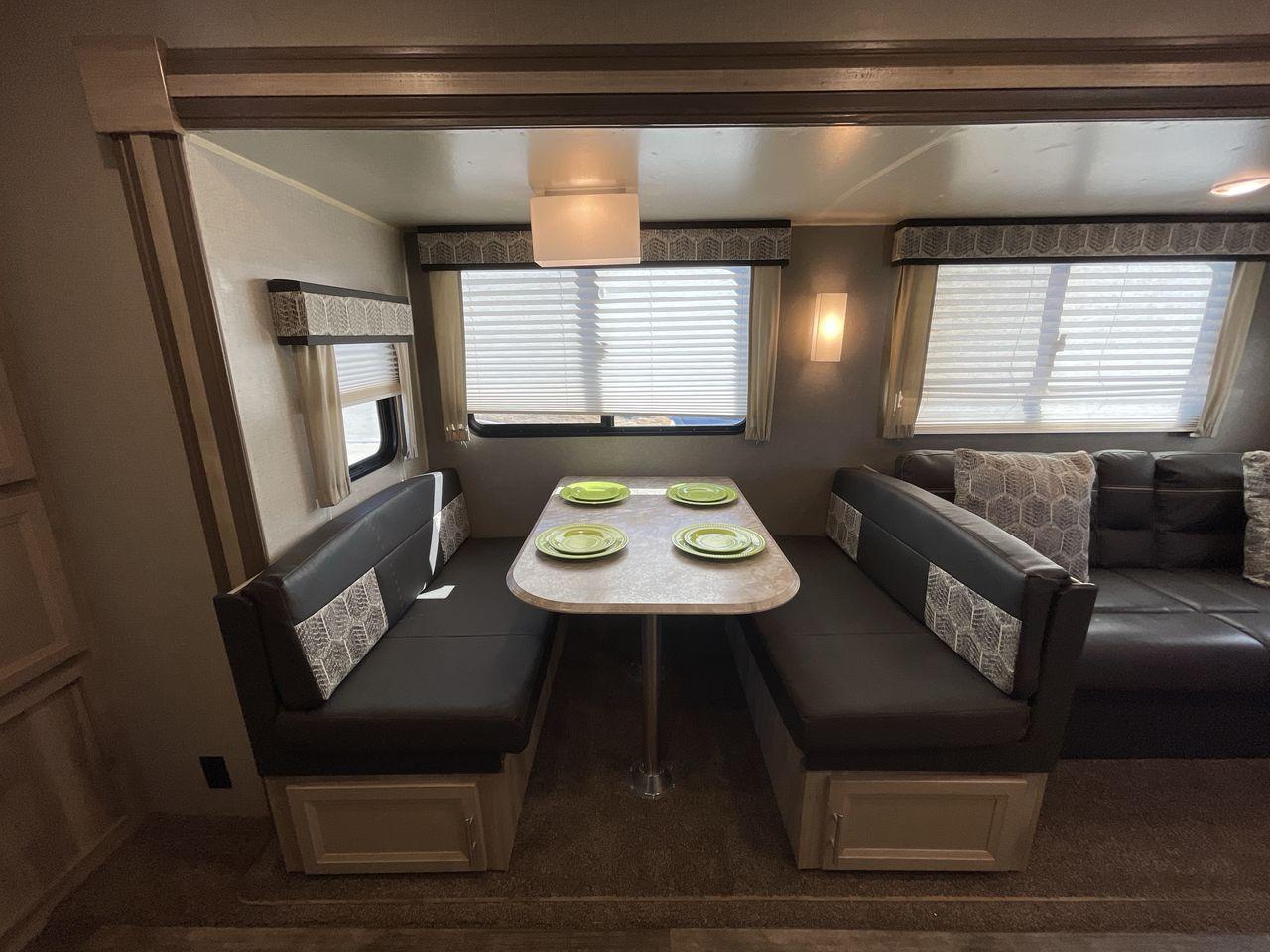 2021 COACHMEN CATALINA 243RBS (5ZT2CANBXMU) , Length: 28.75 ft. | Dry Weight: 5,692 lbs. | Gross Weight: 7,600 lbs. | Slides: 1 transmission, located at 4319 N Main Street, Cleburne, TX, 76033, (817) 221-0660, 32.435829, -97.384178 - The 2021 Forest River Catalina 243RBS travel trailer offers a spacious floorplan that is truly comfortable and convenient. As you enter the trailer, you will find a cozy front bedroom with a lovely queen bed where you can relax and rejuvenate yourself after enjoying the great outdoors. You also have - Photo #14