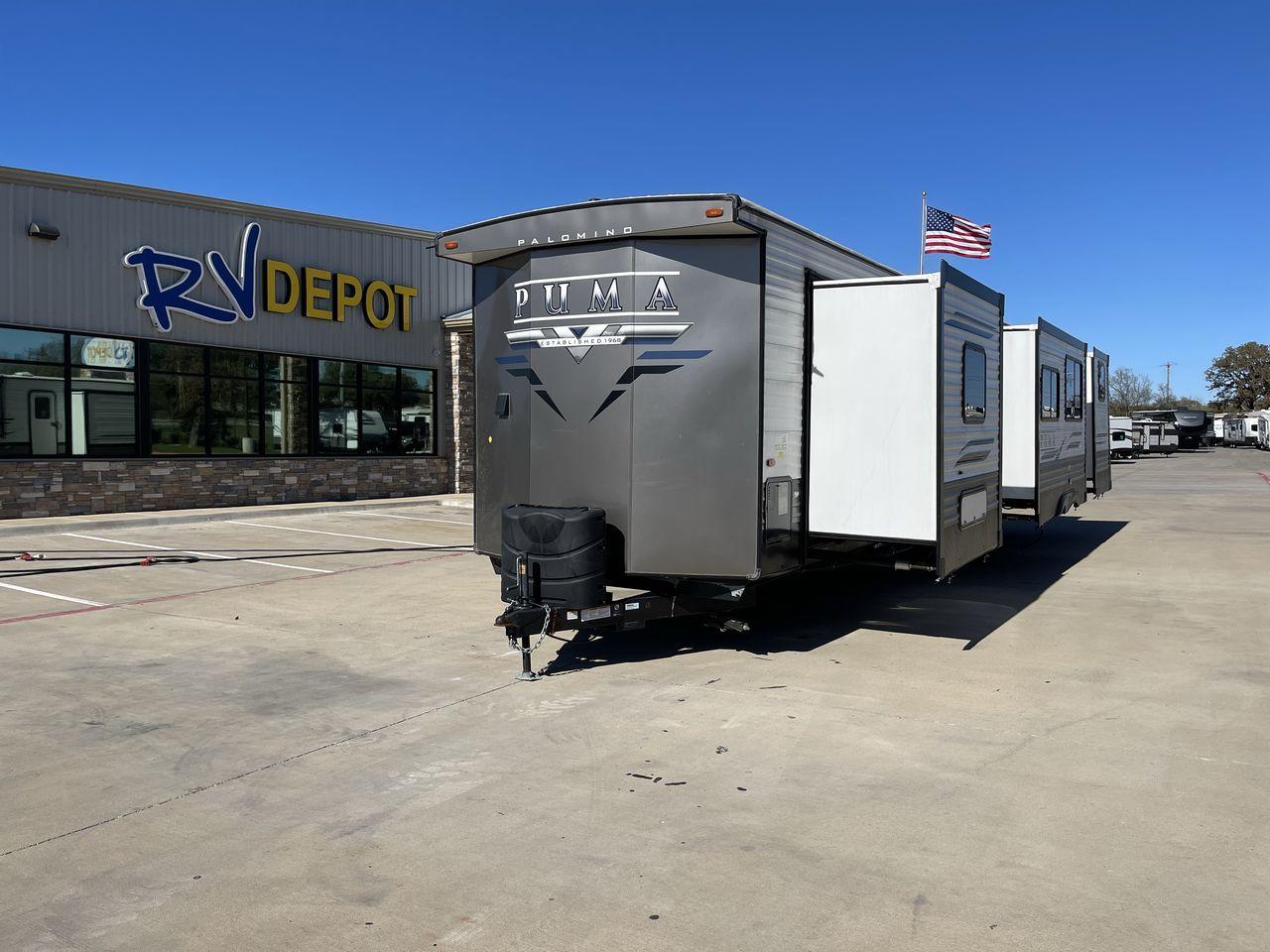 2022 TAN FOREST RIVER PUMA 39PQB (4X4TPUR27NP) , Length: 42.25 ft | Dry Weight: 10,709 lbs | GVWR: 13,413 lbs | Slides: 4 transmission, located at 4319 N Main St, Cleburne, TX, 76033, (817) 678-5133, 32.385960, -97.391212 - Are you in the market for a spacious and luxurious travel trailer in Cleburne, TX? Look no further than RV Depot, where we have an incredible 2022 FOREST RIVER PUMA 39PQB available for sale. With its affordable price of $50,995, this travel trailer is the perfect choice for families or groups lookin - Photo #0
