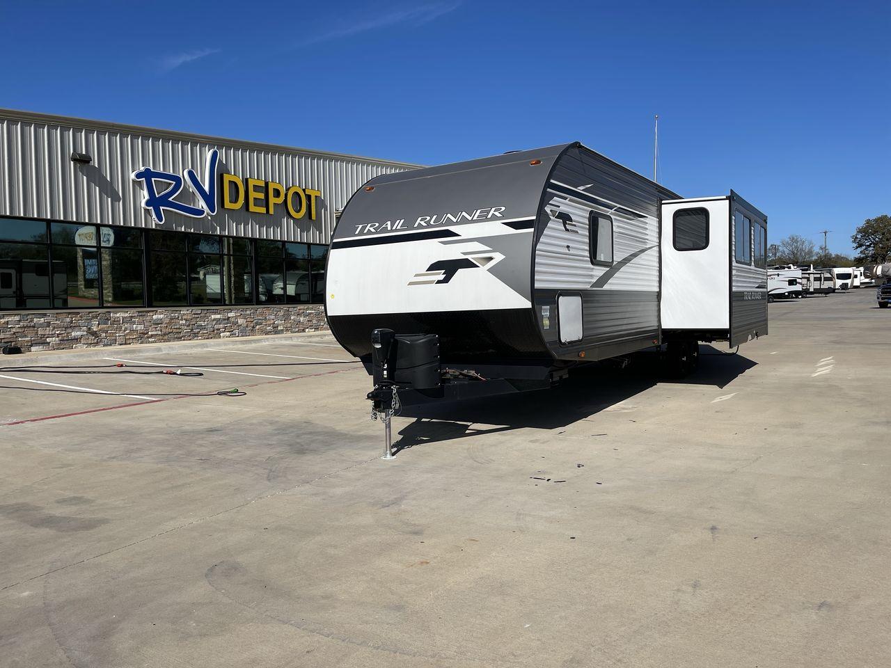 2023 HEARTLAND TRAIL RUNNER 31DB (5SFEB3729PE) , Length: 36.92 ft | Dry Weight: 7,040 lbs | GVWR: 9,642 lbs | Slides: 1 transmission, located at 4319 N Main St, Cleburne, TX, 76033, (817) 678-5133, 32.385960, -97.391212 - Are you ready to embark on the ultimate road trip adventure? Look no further than this incredible 2023 Heartland Trail Runner 31DB travel trailer, available for sale at RV Depot in Cleburne, TX. With its impressive features and unbeatable price of $37,995, this vehicle is a dream come true for any t - Photo #0