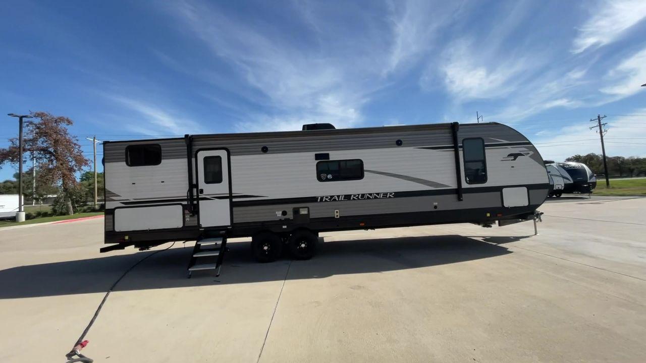 2023 HEARTLAND TRAIL RUNNER 31DB (5SFEB3729PE) , Length: 36.92 ft | Dry Weight: 7,040 lbs | GVWR: 9,642 lbs | Slides: 1 transmission, located at 4319 N Main St, Cleburne, TX, 76033, (817) 678-5133, 32.385960, -97.391212 - Are you ready to embark on the ultimate road trip adventure? Look no further than this incredible 2023 Heartland Trail Runner 31DB travel trailer, available for sale at RV Depot in Cleburne, TX. With its impressive features and unbeatable price of $37,995, this vehicle is a dream come true for any t - Photo #2