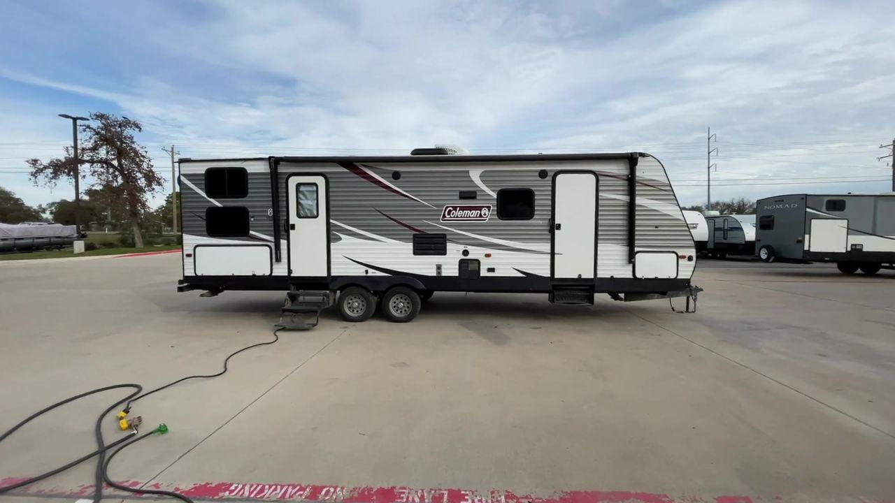 2019 KEYSTONE COLEMAN BH (4YDT28523KY) , located at 4319 N Main St, Cleburne, TX, 76033, (817) 678-5133, 32.385960, -97.391212 - Here are several reasons why this trailer is a must have: (1) The Coleman 215 BH model is packed with features like power jacks, power awning, and solid stance steps. (2) It has an outside kitchen, large double bunks, and a full walk-around bed. (3) Keystone Coleman BH models are known for their - Photo #2