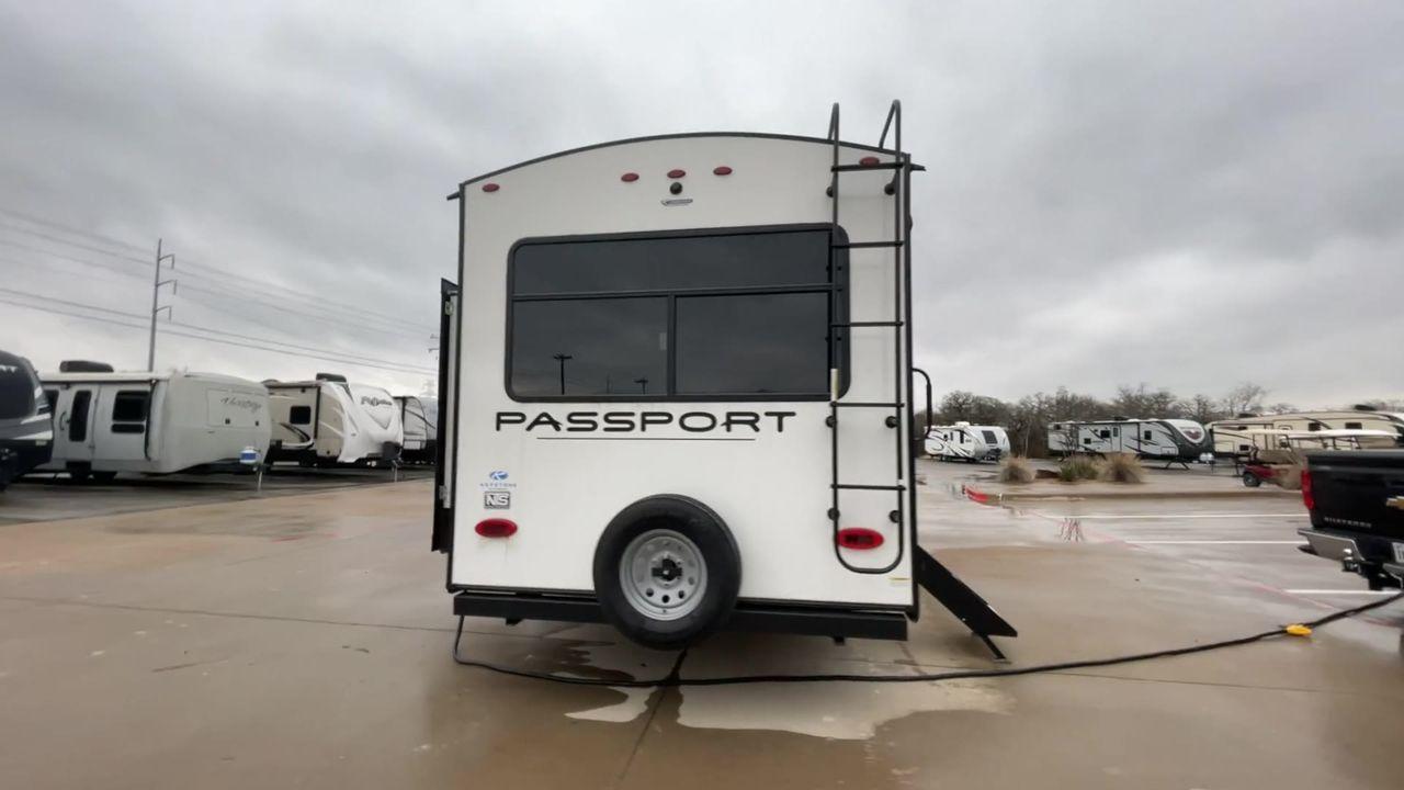 2023 KEYSTONE PASSPORT 2700RL (4YDTPPN25PD) , Dry Weight: 6,380 lbs. | Gross Weight: 8,200 lbs. | Slides: 1 transmission, located at 4319 N Main Street, Cleburne, TX, 76033, (817) 221-0660, 32.435829, -97.384178 - Experience a new level of travel comfort with the 2023 Keystone Passport 2700RL, a travel trailer that sets a new standard for luxury on the road. Crafted with precision, it offers an exceptional camping experience for families and adventure seekers. With a well-thought-out interior design, the Pass - Photo #8