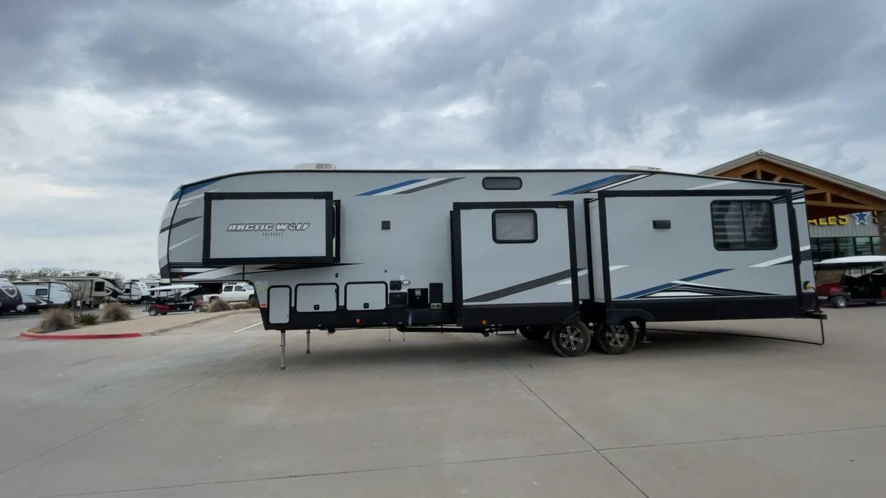 2022 FOREST RIVER ARCTIC WOLF 3550SUIT (5ZT3CK2B4N0) , Length: 38.42 ft. | Dry Weight: XX lbs | Gross Weight:11,645 lbs.| Slides: 3 transmission, located at 4319 N Main St, Cleburne, TX, 76033, (817) 678-5133, 32.385960, -97.391212 - Experience the epitome of camping luxury with the 2022 Forest River Arctic Wolf 3550Suite, a fifth-wheel trailer crafted to enhance your outdoor adventures. This model boasts an impressive length of 39 feet, offering a generously spacious and thoughtfully designed interior. It is specifically design - Photo #6