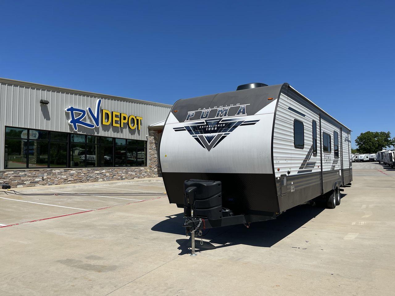2023 FOREST RIVER PUMA 32BH2B (4X4TPUH21PP) , Length: 38.5 ft. | Dry Weight: 9,023 lbs. | Gross Weight: 11,230 lbs | Slides: 3 transmission, located at 4319 N Main St, Cleburne, TX, 76033, (817) 678-5133, 32.385960, -97.391212 - With its ample space and adaptability, the 2023 Palomino Puma 32BH2B travel trailer is perfect for hosting extended families and gatherings. This model provides generous living space while maintaining excellent maneuverability on the road. It measures 38.5 feet in length and has a dry weight of 9,02 - Photo #0