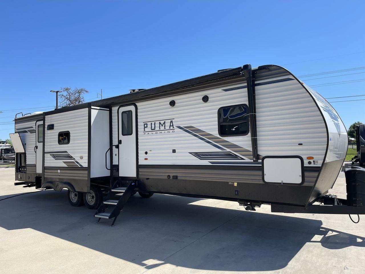 2023 FOREST RIVER PUMA 32BH2B (4X4TPUH21PP) , Length: 38.5 ft. | Dry Weight: 9,023 lbs. | Gross Weight: 11,230 lbs | Slides: 3 transmission, located at 4319 N Main Street, Cleburne, TX, 76033, (817) 221-0660, 32.435829, -97.384178 - With its ample space and adaptability, the 2023 Palomino Puma 32BH2B travel trailer is perfect for hosting extended families and gatherings. This model provides generous living space while maintaining excellent maneuverability on the road. It measures 38.5 feet in length and has a dry weight of 9,02 - Photo #24