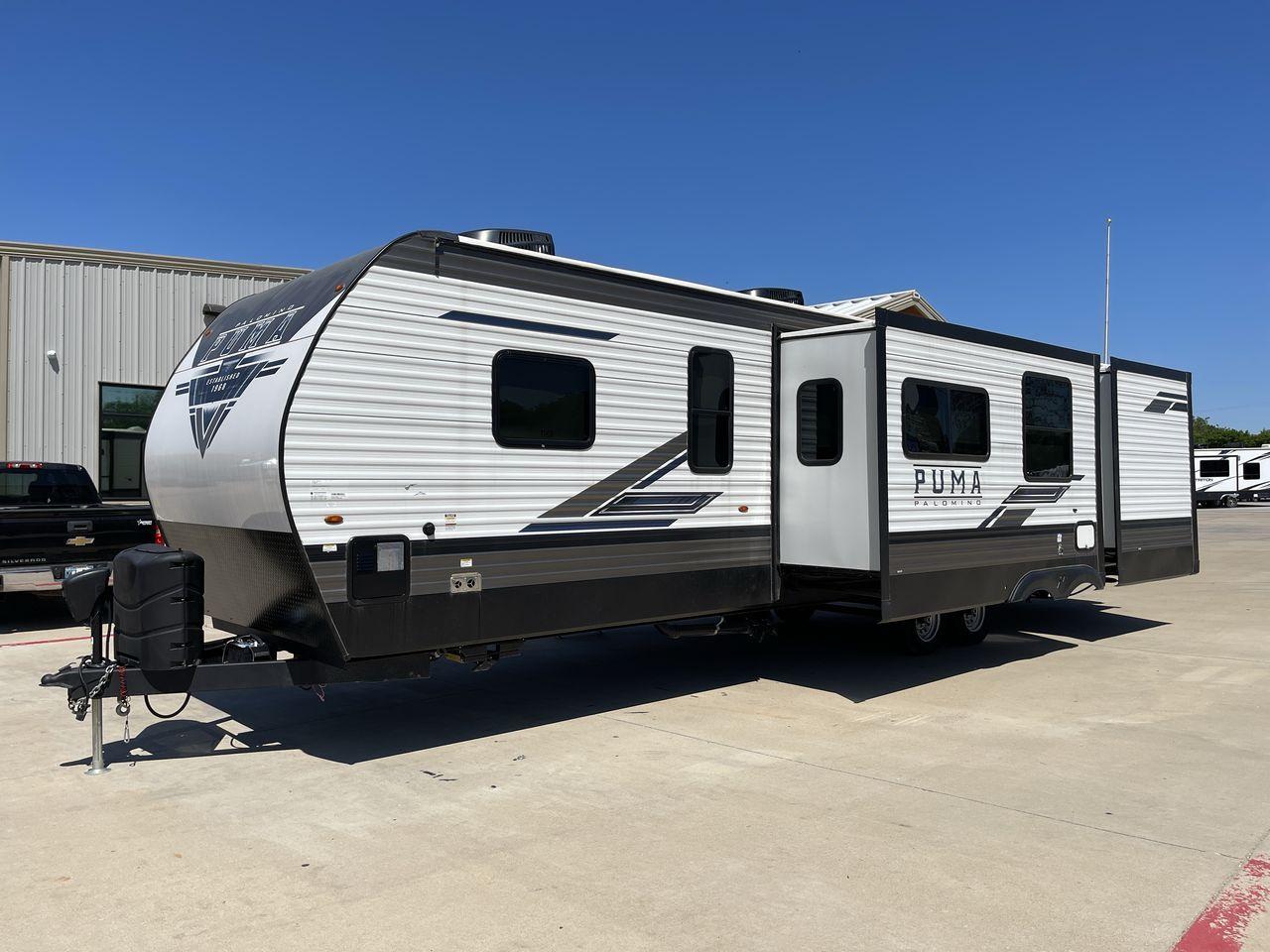 2023 FOREST RIVER PUMA 32BH2B (4X4TPUH21PP) , Length: 38.5 ft. | Dry Weight: 9,023 lbs. | Gross Weight: 11,230 lbs | Slides: 3 transmission, located at 4319 N Main Street, Cleburne, TX, 76033, (817) 221-0660, 32.435829, -97.384178 - With its ample space and adaptability, the 2023 Palomino Puma 32BH2B travel trailer is perfect for hosting extended families and gatherings. This model provides generous living space while maintaining excellent maneuverability on the road. It measures 38.5 feet in length and has a dry weight of 9,02 - Photo #25