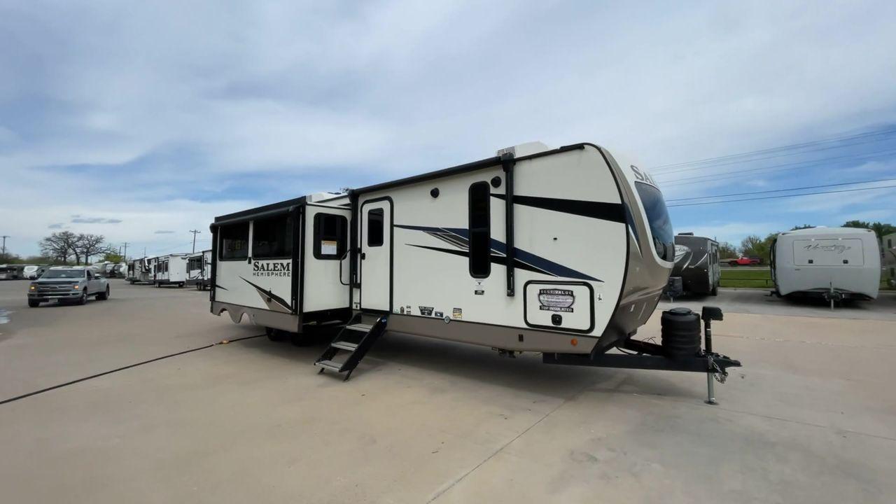 2023 FOREST RIVER SALEM HEMISPHERE 310 (4X4TSBG22PU) , Length: 38.67 ft. | Dry Weight: 9,088 lbs. | Gross Weight: 11,400 lbs. | Slides: 3 transmission, located at 4319 N Main Street, Cleburne, TX, 76033, (817) 221-0660, 32.435829, -97.384178 - The 2023 Forest River Salem Hemisphere 310BHI is a top-notch travel trailer that offers a remarkable level of luxury and ample space, ensuring your utmost comfort and convenience during your outdoor escapades. This model provides generous space for your family and friends, with a length of 38.67 fee - Photo #3